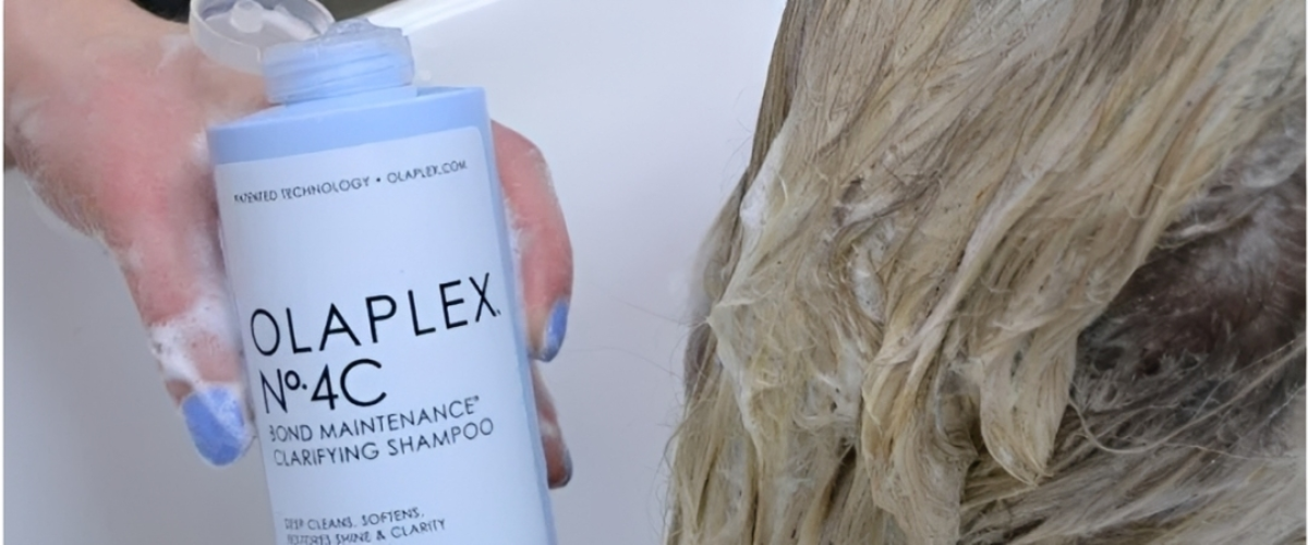 washing womans hair with olaplex No.4C